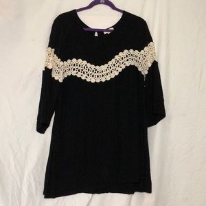 Black dress with cream lace.